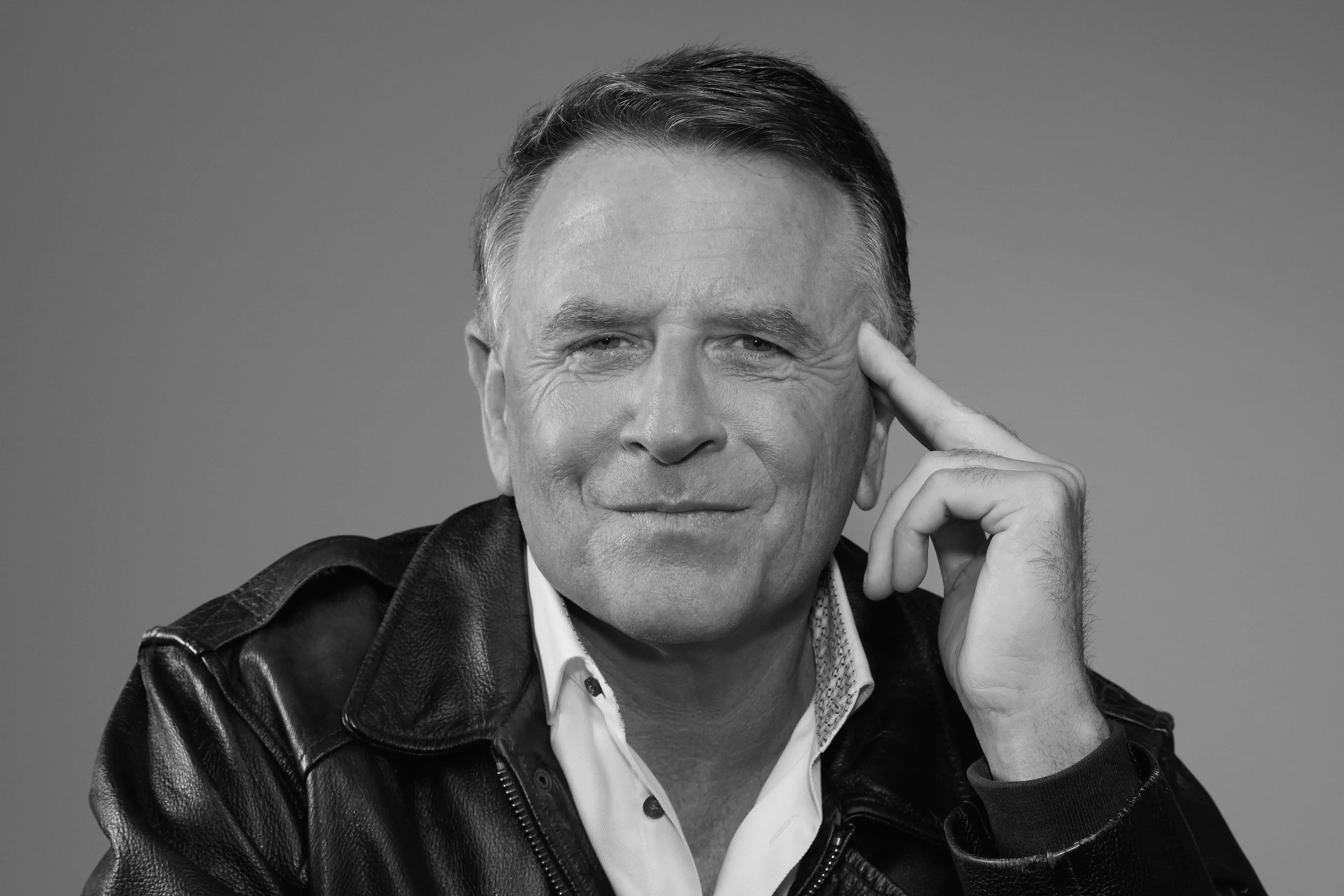 David Chilton in a white shirt and black jacket