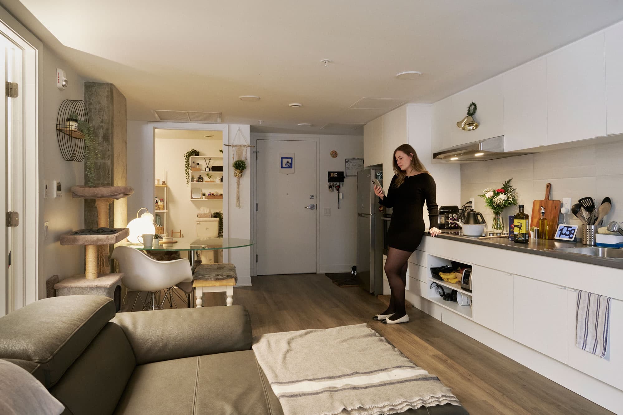 a student standing in the kitchen of her student apartment