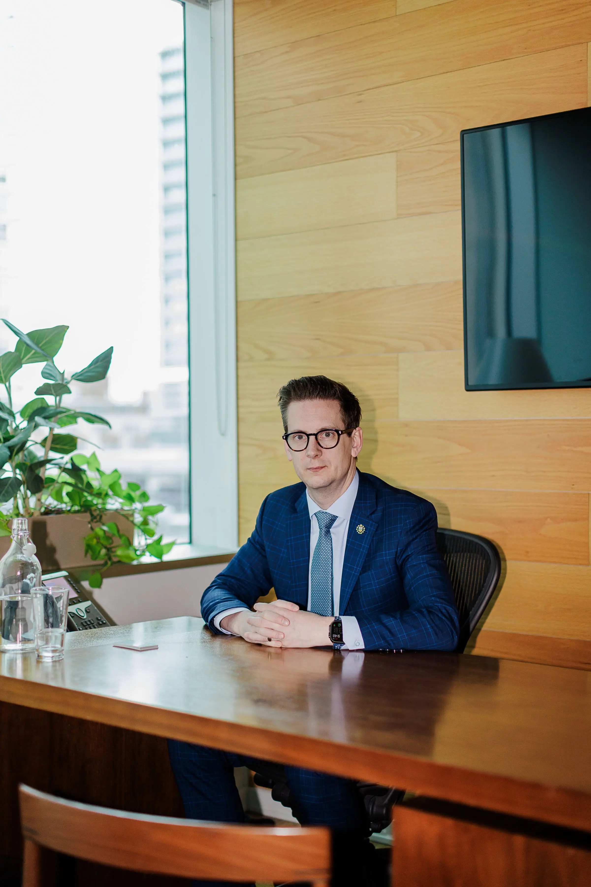 Nate Glubish sitting at a desk