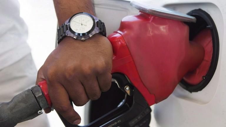 <p>Falling gas prices and a weakening loonie are raising hopes within Canada&#8217;s tourism industry that 2015 will be a banner year. Ian Jack, a spokesman for the Canadian Automobile Association, says if the current price at the pumps holds until the spring, he expects an increase in the number of people travelling by car this year. A person pumps fuel in Toronto after gasoline prices rose overnight on Wednesday, September 12, 2012. THE CANADIAN PRESS/Michelle Siu</p>
