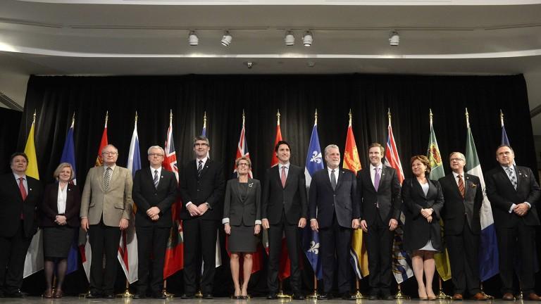 <p>The premiers of the provinces and territories take part in a &#8216;family photo&#8217; during a First Ministers meeting at the Canadian Museum of Nature with Prime Minister Justin Trudeau in Ottawa, on Monday, Nov. 23, 2015. (Adrian Wyld/CP)</p>
