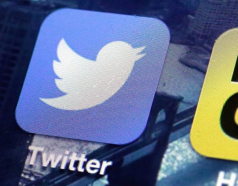 <p>This Friday, Oct. 18, 2013, file photo, shows a Twitter app on an iPhone screen, in New York. (AP Photo/Richard Drew, File)</p>
