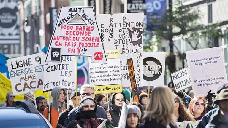 <p>Protestors demonstrate against the Energy East and Line 9B Pipelines during a rally in Montreal, Saturday, October 10, 2015. (Graham Hughes/CP)</p>
