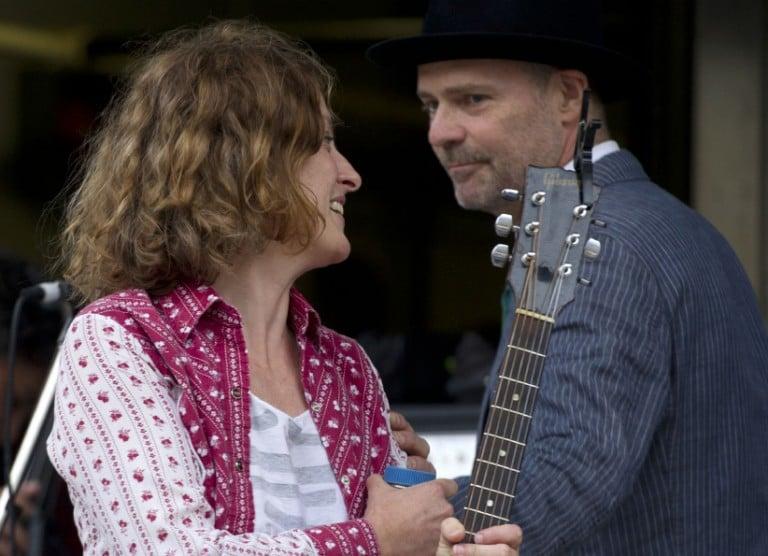<p>Gord Downie congratulated Sarah Harmer after the musicians and there friends put on the &#8220;Rock the Line&#8221; concert to protest Enbridge&#8217;s line 9 oil pipeline. (Lucas Oleniuk/Getty)</p>
