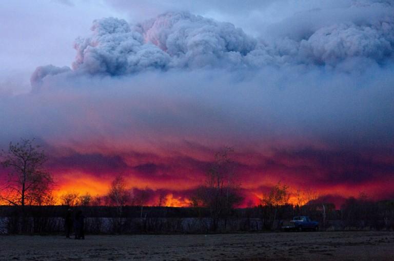 <p>May 4, 2016: A wildfire struck the Fort McMurray area, becoming the most expensive disaster in Canadian history. (Jason Franson/CP)</p>

