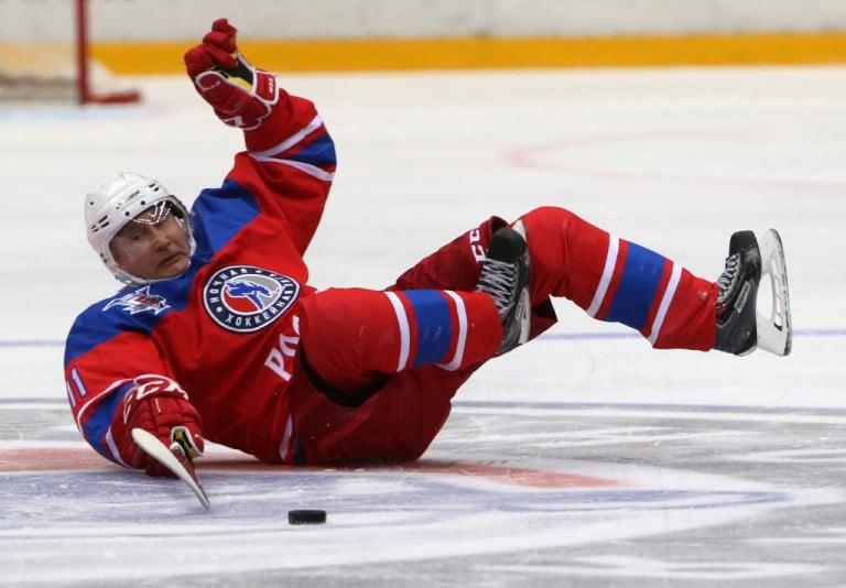 <p>May 10, 2016: President Vladimir Putin falls during a gala hockey game against amateur players, which his team ‘won’ 11-5 in Sochi, Russia. (Mikhail Svetlov/Getty Images)</p>
