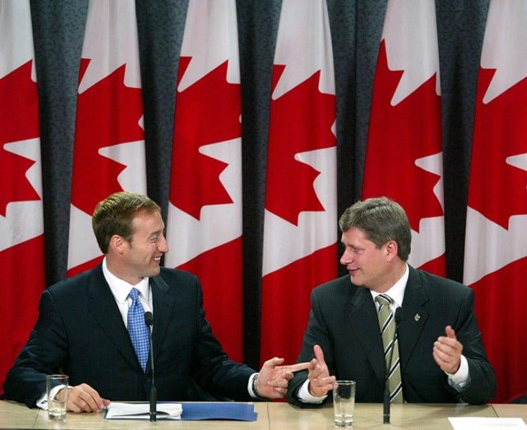 <p>PC leader MacKay and Canadian Alliance leader Harper announce a merger deal with the two parties, in Ottawa, Oct. 16, 2003 (Jonathan Hayward/CP)</p>
