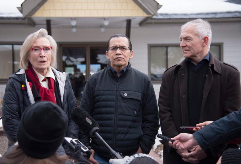 Wet'suwet'en hereditary leader Chief Woos, also known as Frank Alec, centre, Minister of Crown-Indigenous Relation, Carolyn Bennett, left, and B.C. Indigenous Relations Minister Scott Fraser address the media in Smithers, B.C., Sunday, March 1, 2020. (Jonathan Hayward/CP)