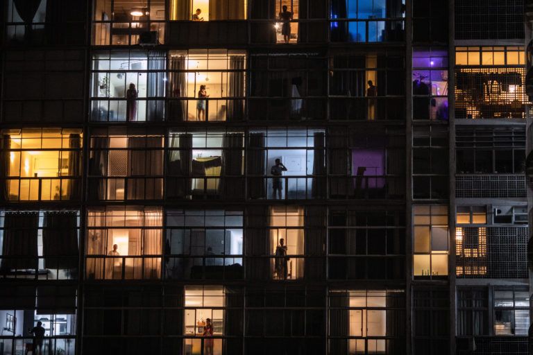 Living quarters lit up in Sao Paulo, Brazil, on March 19, 2020, where many people are staying home because of the coronavirus (Victor Moriyama/The New York Times/Redux)