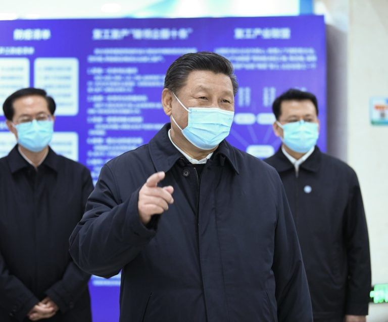 Chinese President Xi Jinping visits an industrial park, which produces high-end auto parts and molds, in Ningbo, east China's Zhejiang Province, March 29. (Yan Yan/Xinhua via ZUMA Wire)