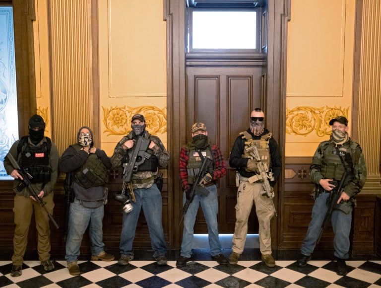 An armed group entered the Michigan State Capitol building to protest the stay-at-home orders, on April 30, 2020 (Seth Herald/Reuters)