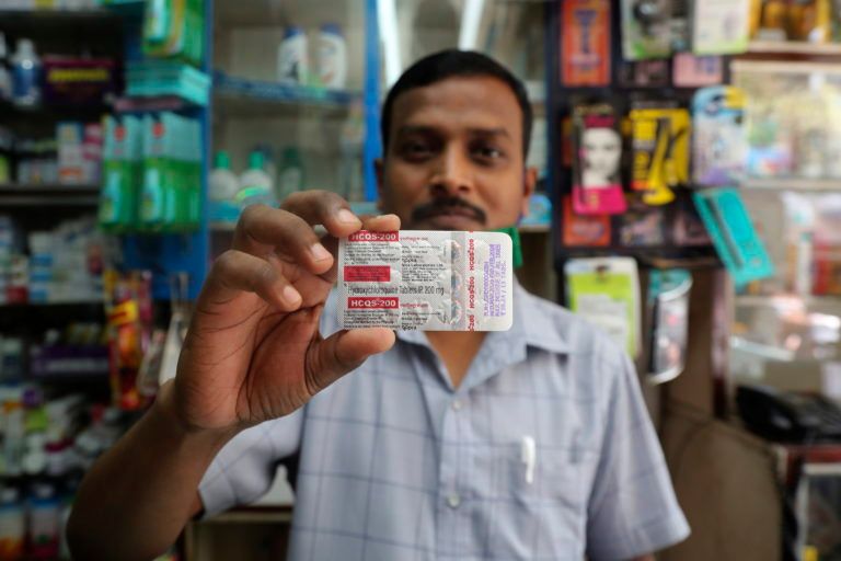 A chemist displays hydroxychloroquine tablets in Mumbai, India, on May 19, 2020. Trump's previous endorsement of hydroxychloroquine catalyzed a tremendous shift in the country, spurring the worlds largest producer of the drug to make much more of it. (Rafiq Maqbool/AP/CP)