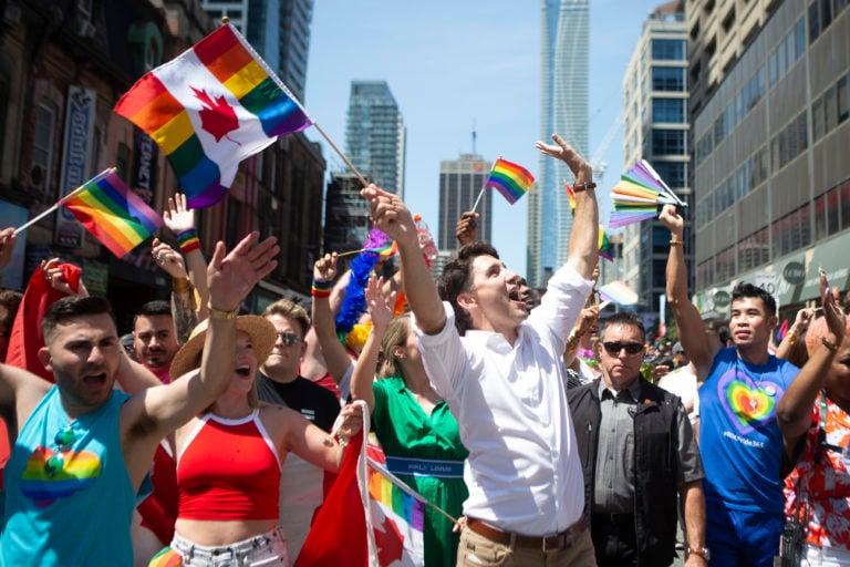 Prime Minister Justin Trudeau walks in Toronto's Pride parade on Jun. 23, 2019. (Chris Young/CP)