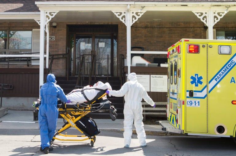 Paramedics transfer a patient from Residence Yvon-Brunet a long term care home in Montreal, Saturday, April 18, 2020, as the COVID-19 pandemic continues in Canada and around the world. (Graham Hughes/CP)