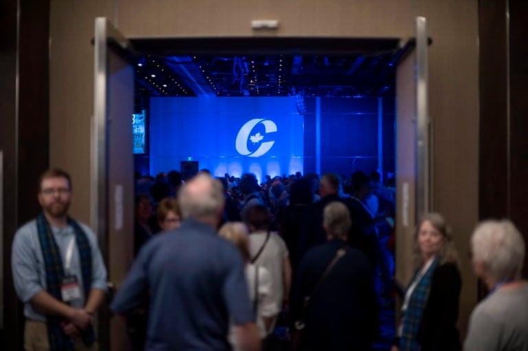 Supporters enter the auditorium for the opening ceremony at the Conservative national convention in Halifax on Aug. 23, 2018. (Darren Calabrese/CP)