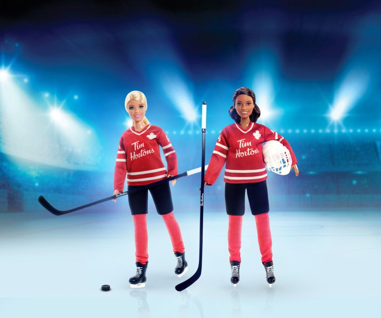 A spokeswoman for Tim Hortons says its restaurants won't be selling a new Barbie made in collaboration with the coffee chain until both Black and white versions of the hockey-themed dolls, seen in an undated handout photo, are available. (Tim Hortons/CP)