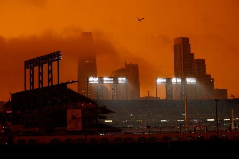 Smoke tinges the sky over Oracle Park before the Giants play the Seattle Mariners in San Francisco (Scott Strazzante/The San Francisco Chronicle/Getty Images)