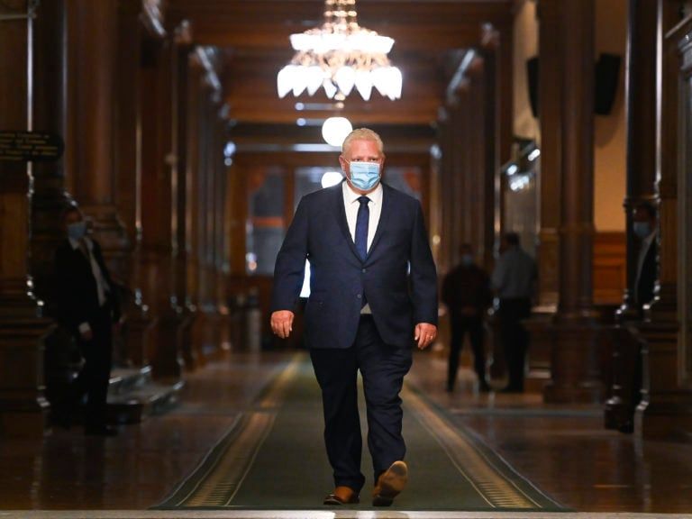 Ontario Premier Doug Ford walks down a hallway at Queen's Park before making an announcement during the COVID-19 pandemic in Toronto on Thursday, September 24, 2020. THE CANADIAN PRESS/Nathan Denette
