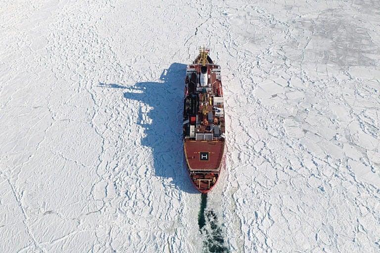 CCGS Louis S. St-Laurent in seen in the Gulf of the St. Lawrence escorting a cargo ship through a path of ice in February 2020. (Courtesy of Canadian Coast Guard)