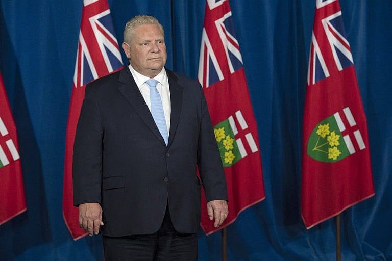 Ontario Premier Doug Ford listens to questions at the daily briefing at QueenÕs Park in Toronto on Tuesday November 17, 2020. THE CANADIAN PRESS/Frank Gunn