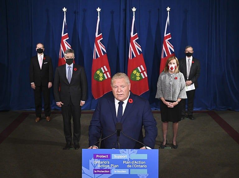 Ontario Premier Doug Ford holds a press conference at Queen's Park during the COVID-19 pandemic in Toronto on Tuesday, November 3, 2020. The provincial government unveiled a new tiered system for COVID-19 restrictions that will give municipalities and public health units guidelines for when to implement lockdows and closures. THE CANADIAN PRESS/Nathan Denette