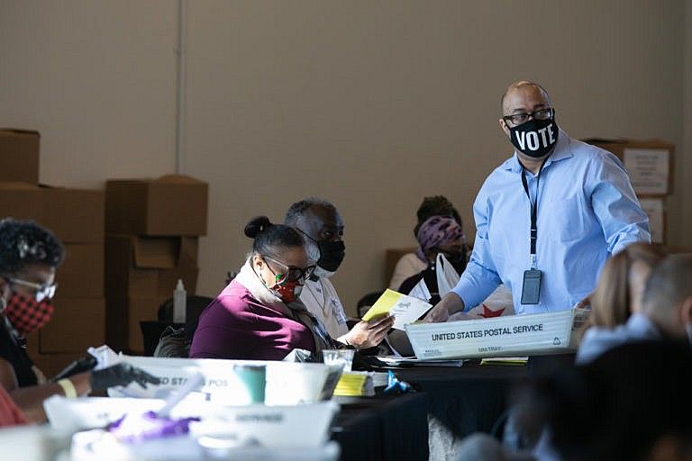 Election workers count Fulton County ballots at State Farm Arena on Nov. 4, 2020 in Atlanta, Georgia (Jessica McGowan/Getty Images)