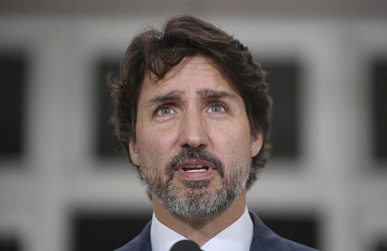 Trudeau responds to a question about China during a news conference outside Rideau Cottage in Ottawa on June 25, 2020 (CP/Adrian Wyld)
