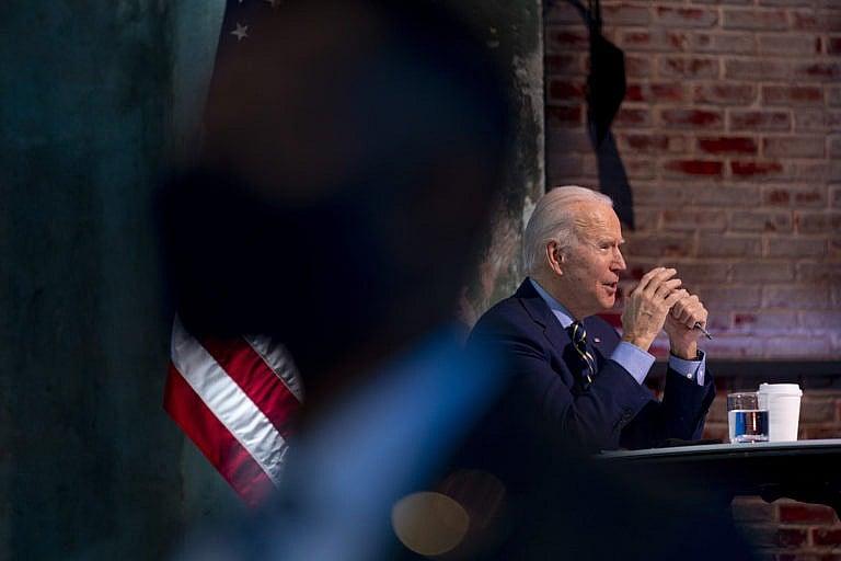 Biden at a recent virtual meeting with members of his national-security and foreign-policy agency review teams. (Andrew Harnik/AP)