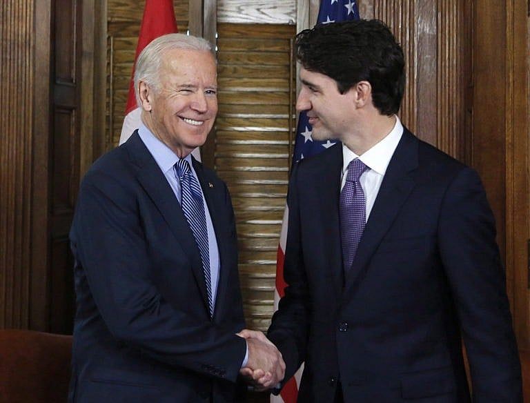 Trudeau shakes hands with Biden on Parliament Hill in Ottawa on Dec. 9, 2016 (CP/Patrick Doyle)