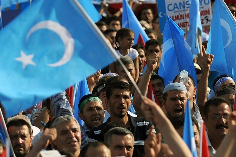 Protesters rally in solidarity with Turkic-speaking Muslim Uyghurs, in Istanbul on July 12, 2009 (BULENT KILIC/AFP via Getty Images)