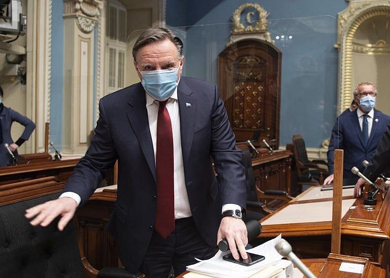 Legault arrives for question period on Tuesday at the Quebec National Assembly (Jacques Boissinot/CP)