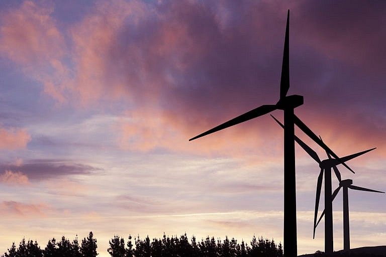 Wind turbines at sunset in Alberta, Canada. (iStock)