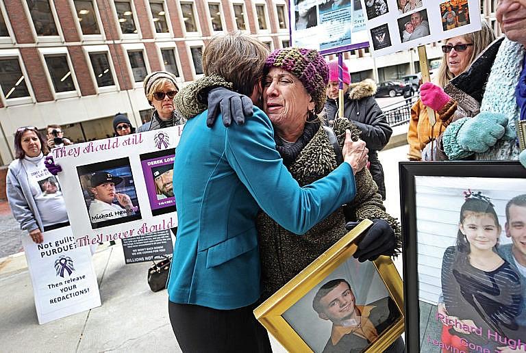 Paula Haddad, whose son died from opioids, outside a Boston courthouse in January 2019 (Suzanne Kreiter/The Boston Globe/Getty Images)