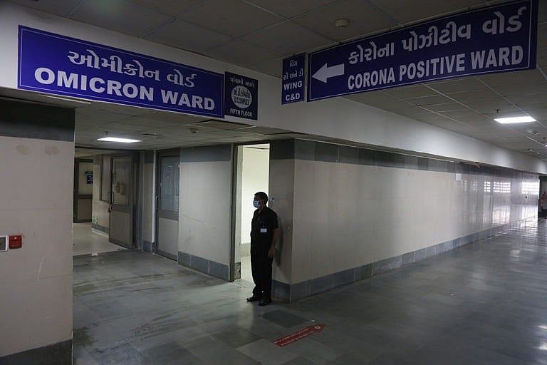 A security man stands guard outside a ward being prepared for the omicron coronavirus in Ahmedabad, India, on Dec. 6, 2021. (Ajit Solanki/AP)