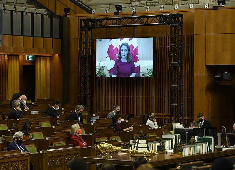Freeland is seen via videoconference as she presents a fiscal update in the House of Commons on Parliament Hill in Ottawa, Dec. 14, 2021. (Justin Tang/The Canadian Press)