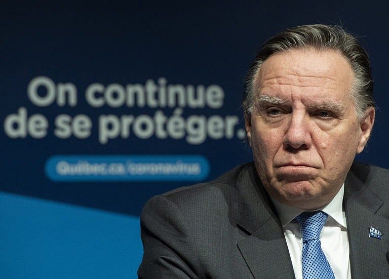 Legault speaks during a news conference in Montreal on Dec. 30, 2021 (Graham Hughes/CP)