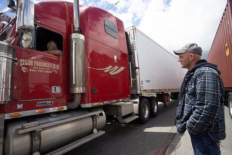 Truckers stuck at the border due to a demonstration over COVID-19 travel restrictions on highway 104 in Nova Scotia, June 23, 2021. (Riley Smith/The Canadian Press)