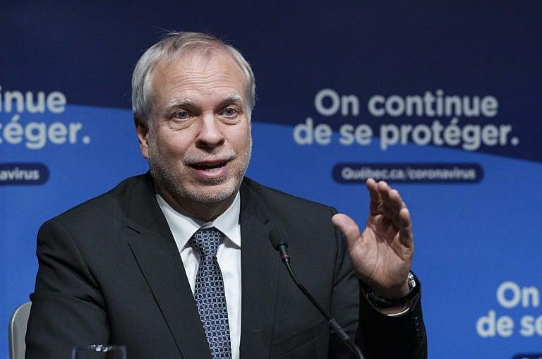 Interim Quebec Director of Public Health Dr. Luc Boileau responds to a question during a news conference in Montreal, Jan. 11, 2022. (Paul Chiasson/The Canadian Press)