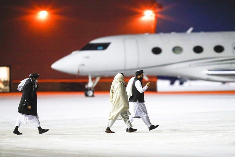 Representatives of the Taliban leave Gardermoen Airport after attending meetings in Oslo, Norway, on Jan. 25, 2022 (Javad Parsa/NTB via AP)