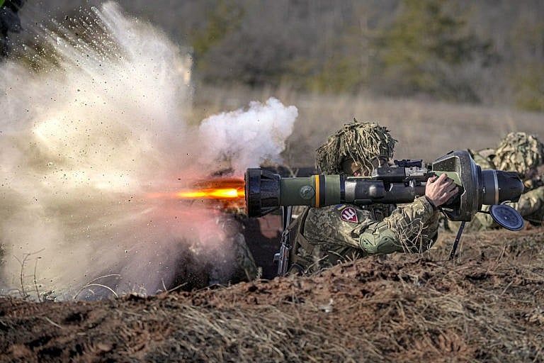 A Ukrainian serviceman fires an NLAW anti-tank weapon during an exercise in the Joint Forces Operation, eastern Ukraine, Feb. 15, 2022. (Vadim Ghirda/AP)