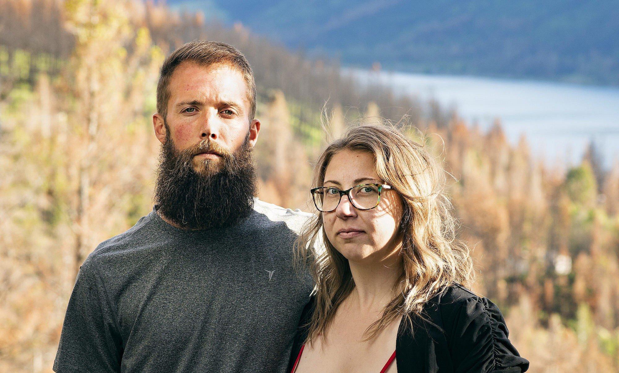 On edge: Kody and Ashlynn Kruesel fled a big fire in their tiny village of Monte Lake with little time to spare. They returned soon after to help fight it.